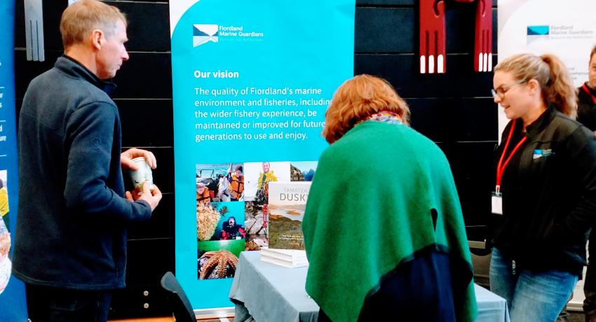 Fiordland Marine Guardians discussing fisheries sustainability with the community at the Southland Boat Show August 2021